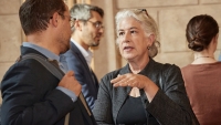 Faculty members in conversation